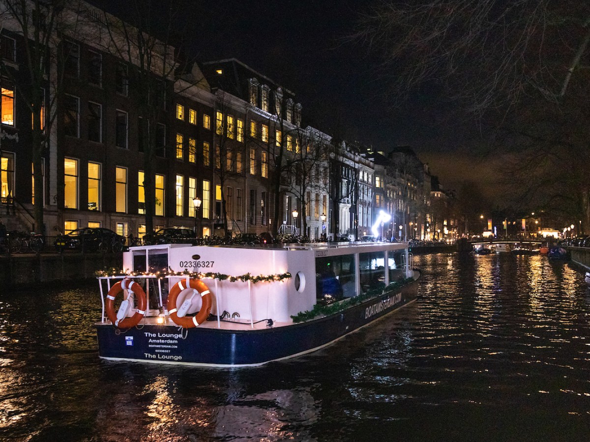a boat that is lit up at night