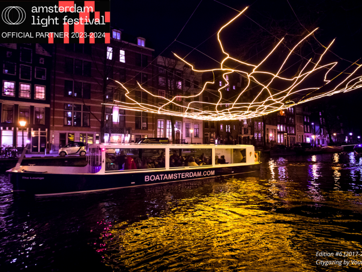 a boat that is lit up at night