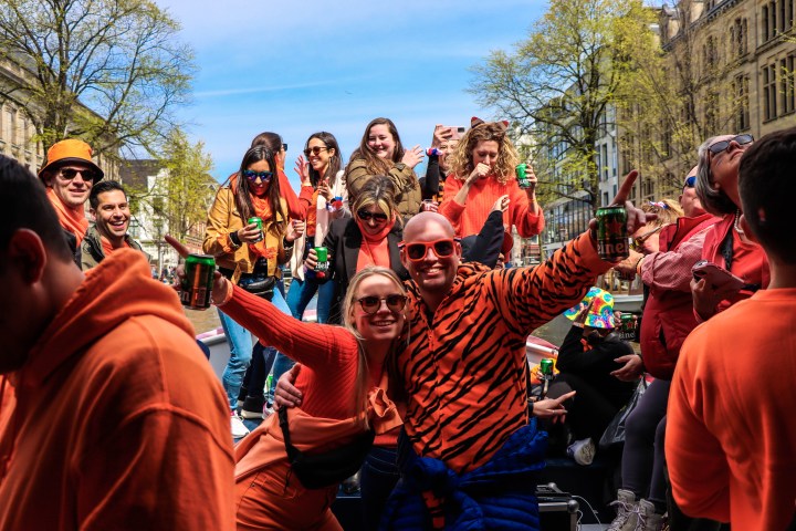 a group of people standing in front of a crowd