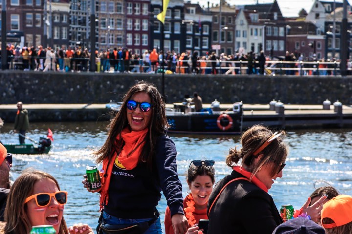 a group of people standing in front of a crowd