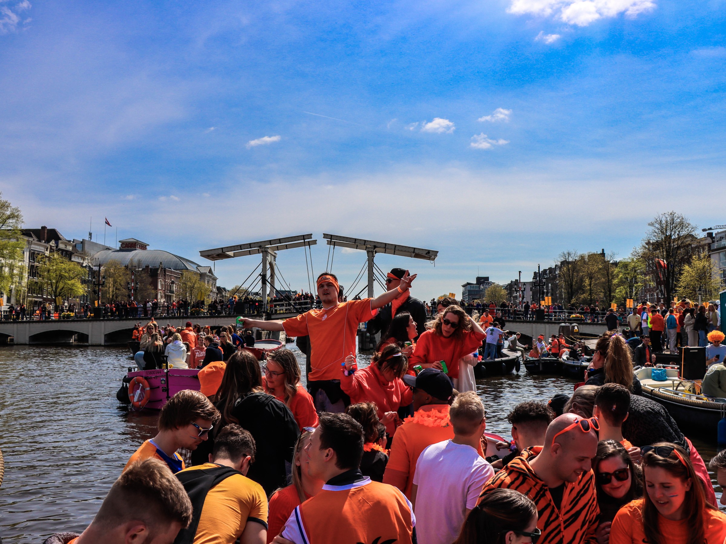 a group of people standing in front of a crowd