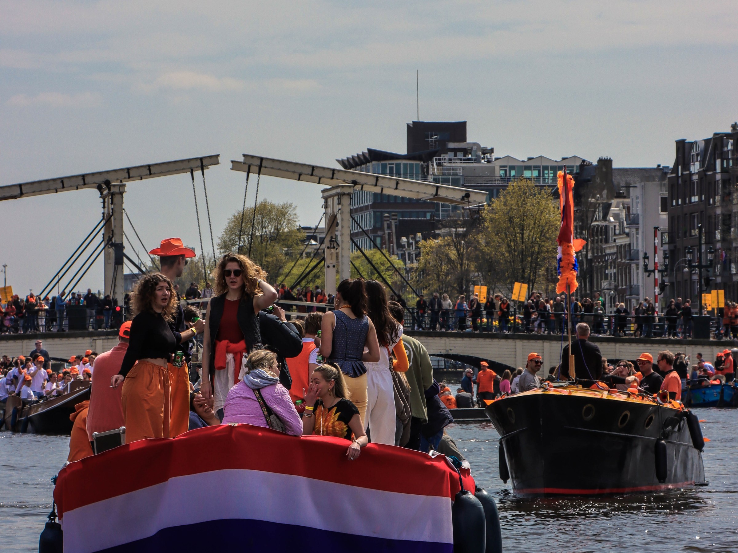 a group of people on a boat in a large body of water