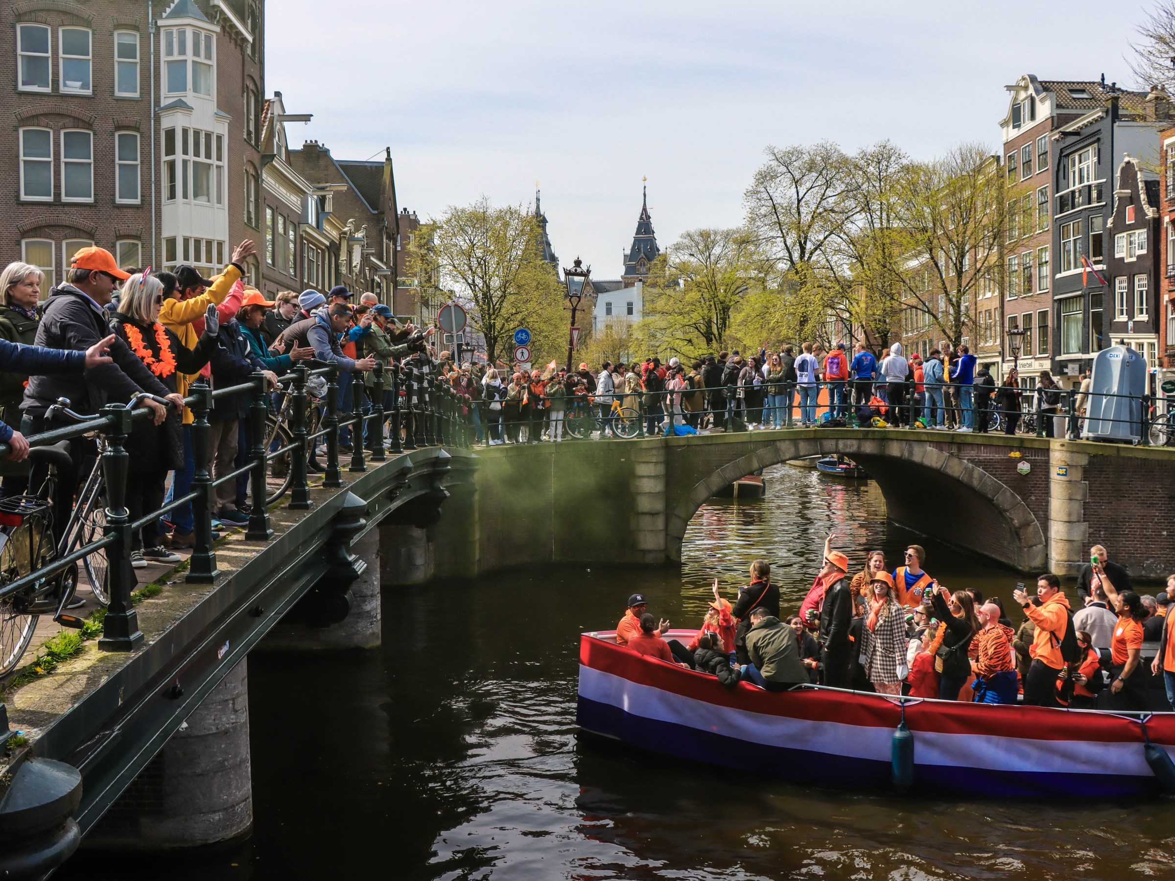 a group of people riding on the back of a boat